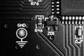 Black and white close up for ground test point next to microcontroller Royalty Free Stock Photo