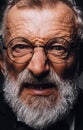 Old man with angry evil horror expression on face, close up on black background Royalty Free Stock Photo