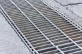 Black and white close up of a sidewalk subway grate with shallow Royalty Free Stock Photo