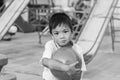 Sad Asian child boy losing of competition football game. He feeling sad and moody. Sport and kid concept. Royalty Free Stock Photo