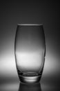 Black and white colored concept art with a glass in a studio