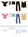 Black, white and colored underwear is dried after washing on a rope with clothespins.