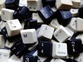 Black and white computer keyboard keys, mostly numeric with ML Machine learning buttons at the front. Concept of unstructured