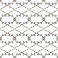Black and white contrasting openwork seamless pattern of rhombuses and curls retro vector background