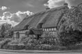 Black and White of Thatched Roof Cottage