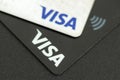 Black and white credit cards Visa close up. Visa contactless payment cards closeup. Top view. Selective focus Royalty Free Stock Photo