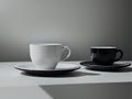 black and white cups on a table