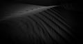 Black and white dark texture of desert sand dunes Royalty Free Stock Photo