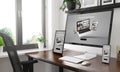 black and white desktop with three devices showing responsive website Royalty Free Stock Photo
