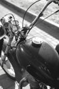Black and white. Details of an old retro motorcycle, classic vintage tech. chrome and restoration. collecting vehicles. vertical