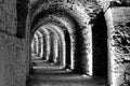 Black and white developed photo of the interior of the castle Karak with electric lights attached for the tourists and visitors