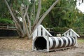 Black & white dog tunnel for agility dog training program equipment in the dog park Royalty Free Stock Photo