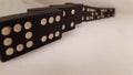 Black and White dominos in a line Royalty Free Stock Photo