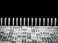 Black and White Dominos - tiles and lined up Royalty Free Stock Photo