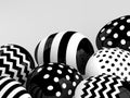 Black and white Easter eggs over light grey background