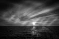 Black and white effect of reflection of the sunset over the sea Royalty Free Stock Photo