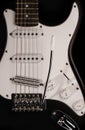 Black and white electronic guitar close up view Royalty Free Stock Photo