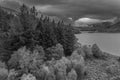 Black and white Epic aerial flying drone landscape image of Snowdon Massif viewed from above Llynau Mymber during Autumn sunset Royalty Free Stock Photo