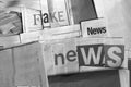 Black and white Fake news on newspapers Royalty Free Stock Photo