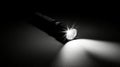 A black and white flashlight. Royalty Free Stock Photo