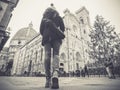 black and white florence italy woman walking towards the cathedral with backpack at Christmas