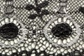 Black and white flowers lace material texture macro shot Royalty Free Stock Photo