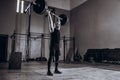 Black and white full length portrait of Strong man lifting a barbell during crossfit workout at gym Royalty Free Stock Photo