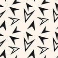 Black and white geometric seamless pattern with scattered triangles, arrows Royalty Free Stock Photo