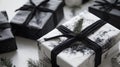 Black and White Gift Box with Green Pine Branch Royalty Free Stock Photo