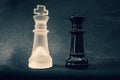 Black and white glass King and Queen chess pieces Royalty Free Stock Photo