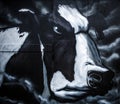 Black-white gloomy cow of graffiti drawing on street wall