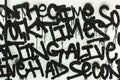 Black and white graffiti drawing from random words in a beautiful font on the wall as decoration or decoration