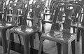 Black and white, Group of plastic chairs in natural light Royalty Free Stock Photo