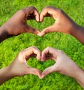 Black and white hands in heart shape, interracial friendship concept Royalty Free Stock Photo