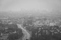 Black & white hazy cityscape view from the Hollywood Bowl Overlook on Mulholland Drive, in Los Angeles, California Royalty Free Stock Photo