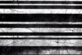 Black and white horizontal striped wall design from concrete rough long blocks. Abstract industrial cement grunge
