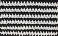 Black and white horizontal stripes - crocheted texture background, concept of contrast in life, ups and downs. Black and white