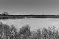 Black and white iced over pond in New York Mills, Minnesota