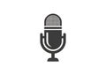 Black and white illustration of a classic microphone with a retro design. The mic features a Royalty Free Stock Photo