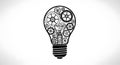 A black and white illustration of a light bulb filled with an array of interlocking gea Royalty Free Stock Photo