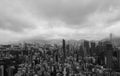 Black and white image of aerial view of Hong Kong apartments in cityscape background, buildings in Sham Shui Po District.