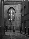 Black and white image of atmospheric alley with cobblestone in London Royalty Free Stock Photo