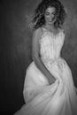 A black and white image of a beautiful young woman wearing a vintage wedding dress Royalty Free Stock Photo