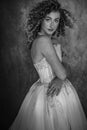 A black and white image of a beautiful young woman wearing a vintage wedding dress Royalty Free Stock Photo