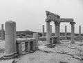 Black and white image of columns and stones at ancient Roman ruins of Lep Royalty Free Stock Photo