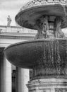 Ancient fountain in st. peter`s square at the vatican