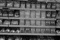 Black and White Image of Different types of cheese on shelves in a grocery store. Shelf of packaged products, butter and cheese at Royalty Free Stock Photo