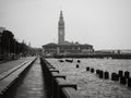 Black and white image of the ferry building in San Francisco on a rainy day