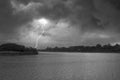 Hard lightning strike with black clouds in cyclone storm