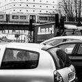 High Street Trwffic Jam With A Train Crossing A Railway Bridge